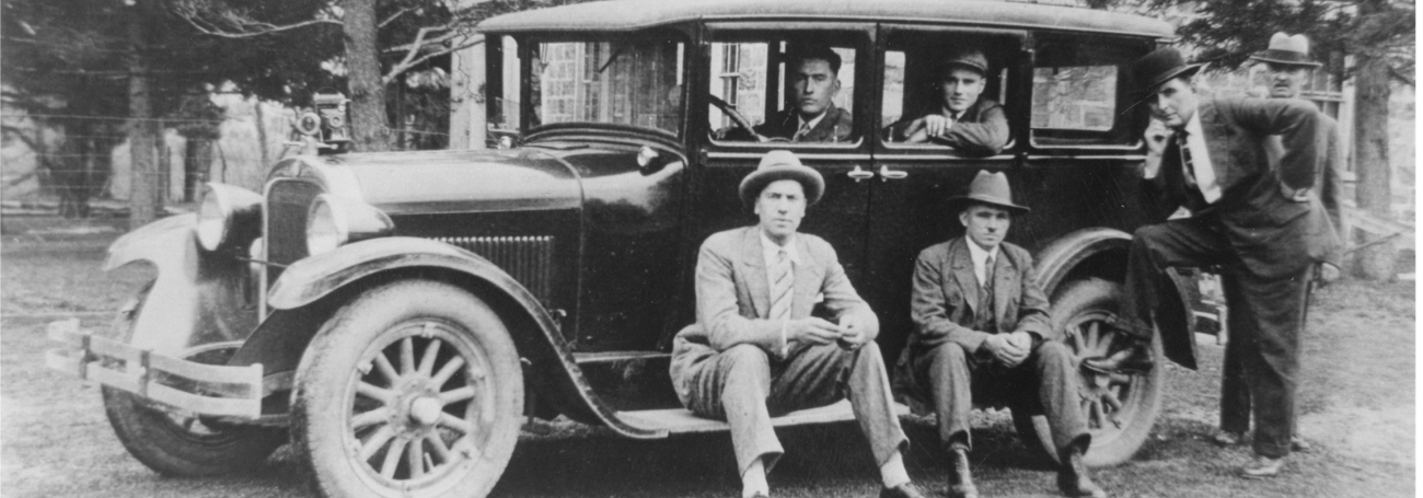 Men in old car